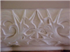 Face Design on Wall Closeup
