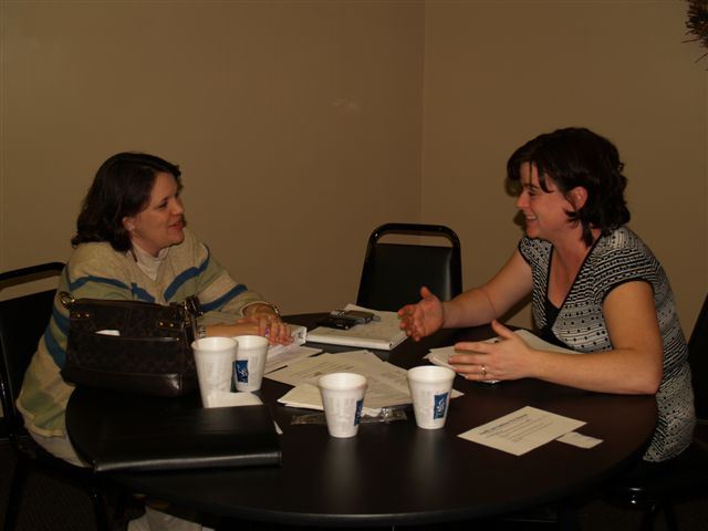 Two female members of Family and Children First Council speaking