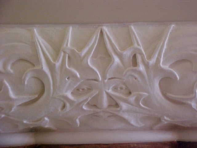 Face Design on Wall Closeup